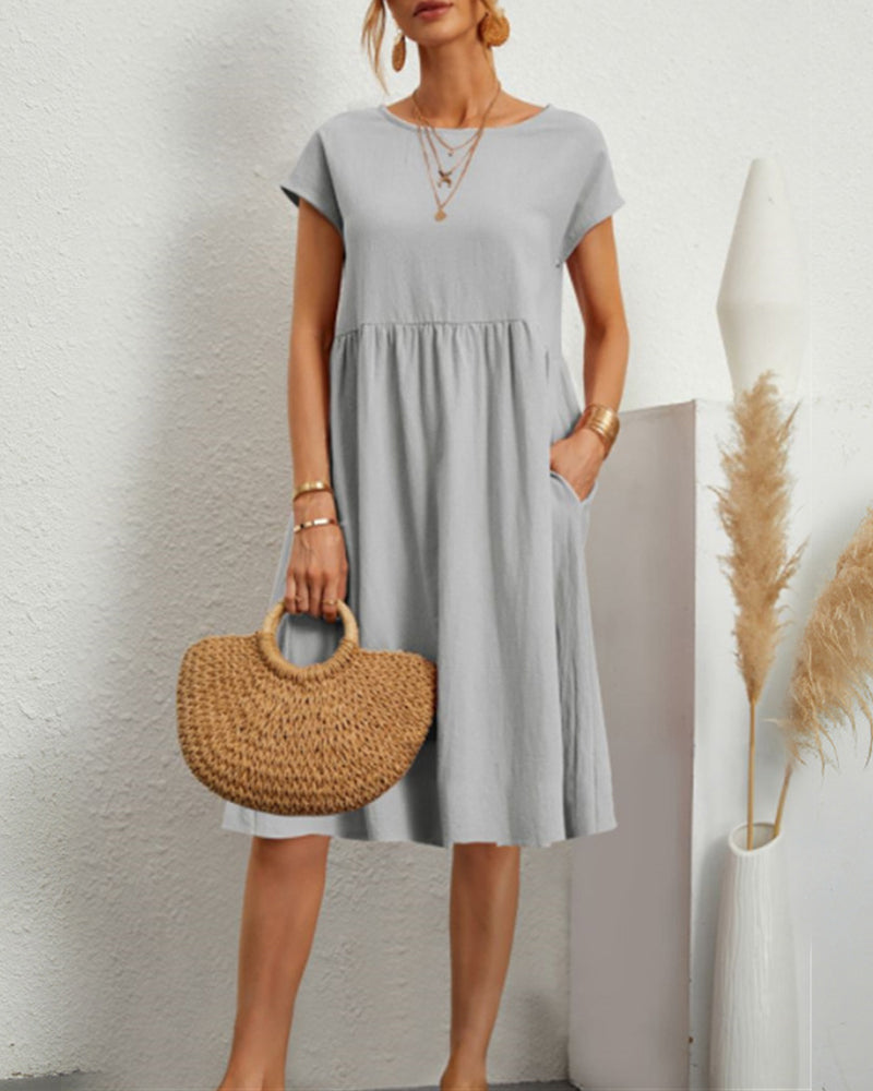 Carlota | Cómodo vestido midi con escote redondo y bolsillos