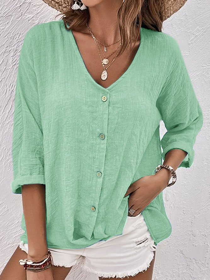 Candela | Blusa de lino con cuello de pico