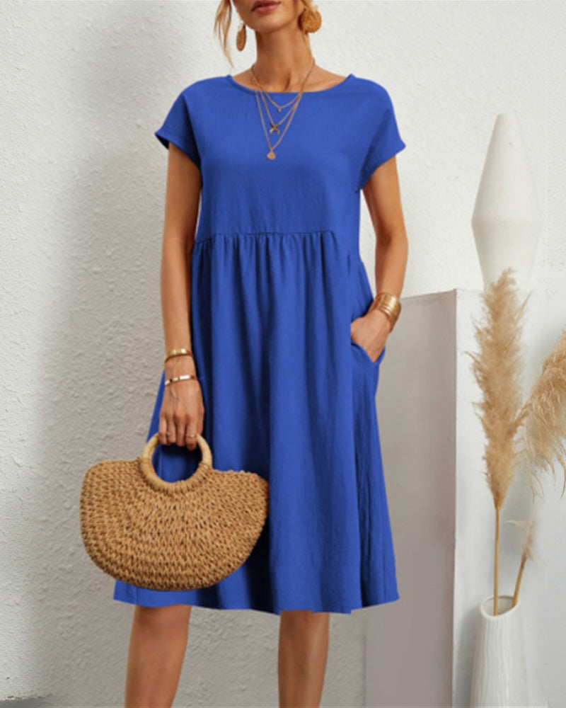 Carlota | Cómodo vestido midi con escote redondo y bolsillos