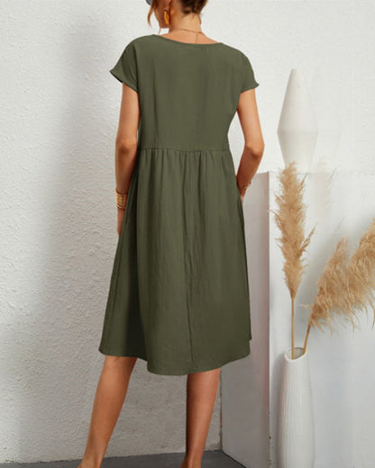 Carlota | Cómodo vestido midi con escote redondo y bolsillos