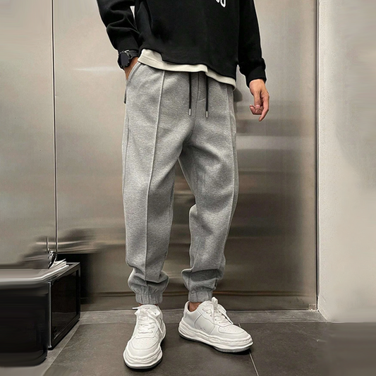 Pantalones suaves para hombre, diseño jogger con cintura elástica y corte holgado