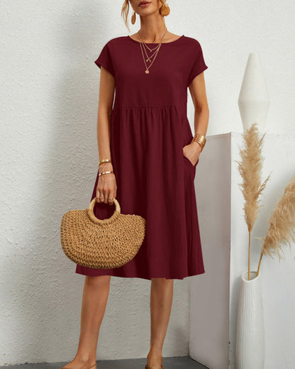 Carlota | Cómodo vestido midi con escote redondo y bolsillos