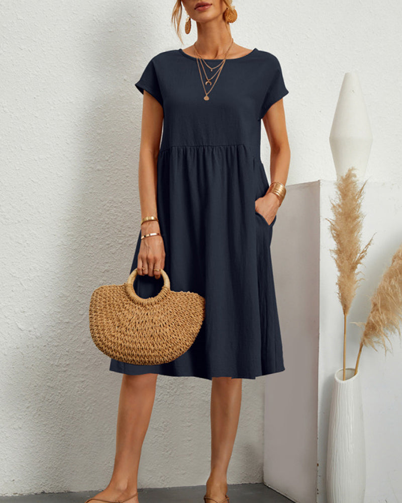 Carlota | Cómodo vestido midi con escote redondo y bolsillos