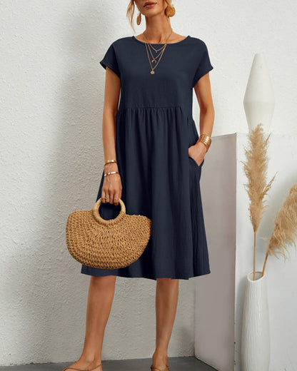Carlota | Cómodo vestido midi con escote redondo y bolsillos