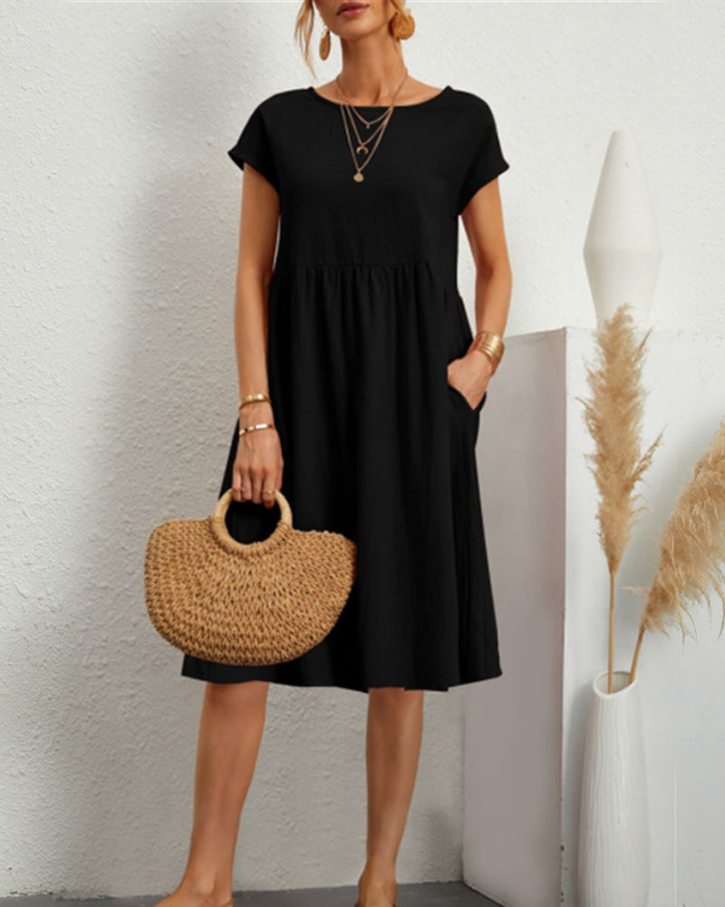 Carlota | Cómodo vestido midi con escote redondo y bolsillos