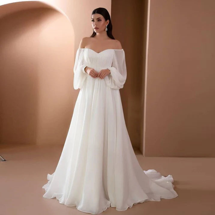 Vestido elegante blanco largo con abertura formal para ceremonia