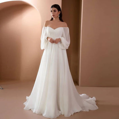 Vestido elegante blanco largo con abertura formal para ceremonia