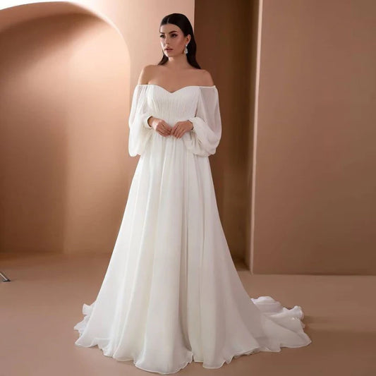 Vestido elegante blanco largo con abertura formal para ceremonia