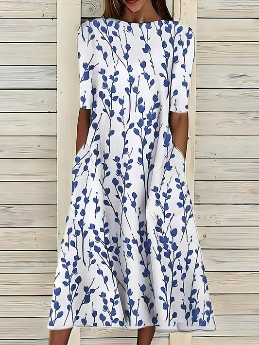 Linn | Veraniego vestido midi con escote redondo y estampado floral costero