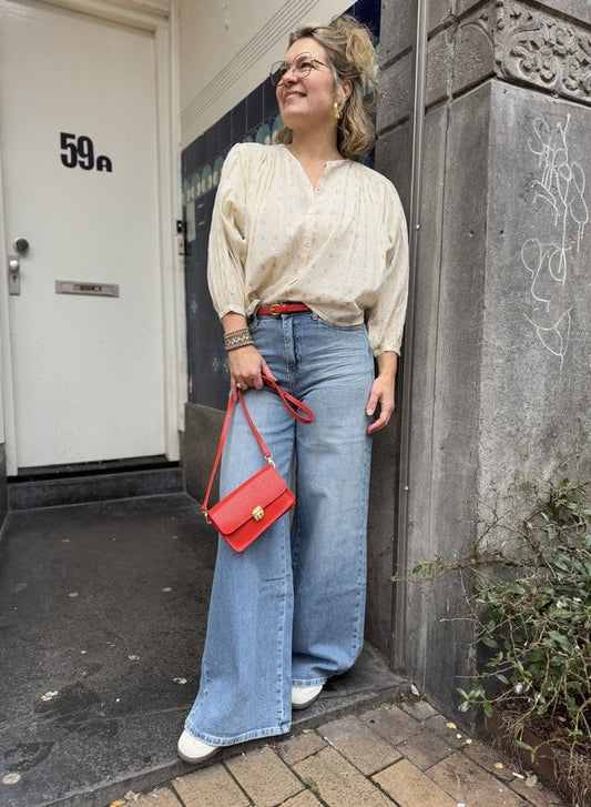 Blusa blanca y azul
