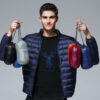 Chaqueta de plumón ultraligera para hombre: cálida, transpirable y azul oscuro.
