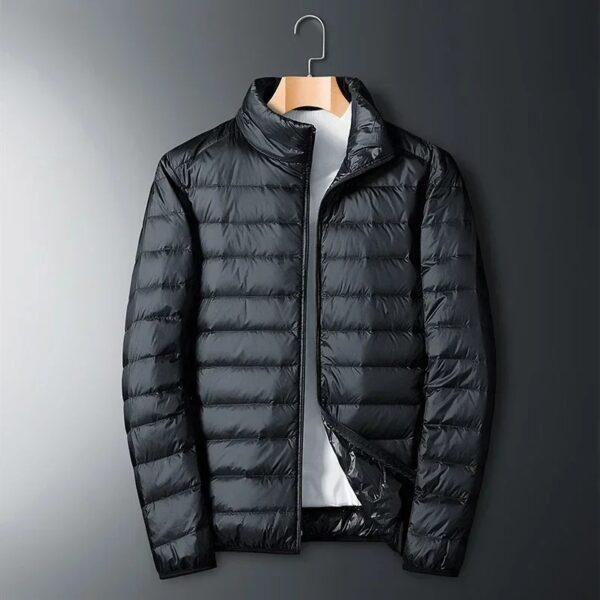 Chaqueta de plumón ultraligera para hombre: cálida, transpirable y azul oscuro.