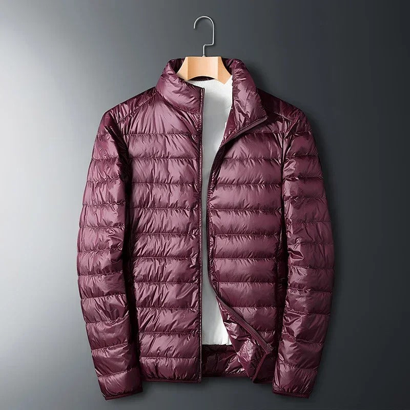 Chaqueta de plumón ultraligera para hombre: cálida, transpirable y azul oscuro.